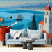 Coastal view mural in a sun-drenched home office space with a white desk and minimalist styling.
