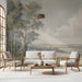 A serene living room featuring a wide landscape mural behind a neutral linen sofa.