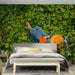 Green clover leaf mural in a bright and airy bedroom
