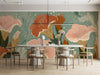 Modern living room with a sage green floral feature wall and minimalist furniture