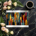 Living room accent wall featuring an abstract, colorful urban skyline mural