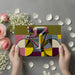 Modern patterned wallpaper featuring a racing cyclist in a contemporary living room setting.