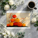 A breakfast nook featuring a warm pumpkin harvest wallpaper that adds a cozy and festive focal point to the room.