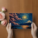 The impressionistic cherry blossom mural creates a meditative focal point in a modern, minimal primary bedroom suite.