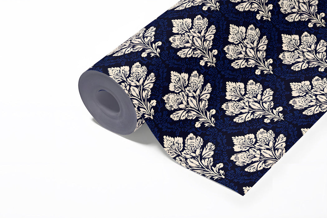 Sophisticated home library or study with blue damask wallpaper and classic decor.