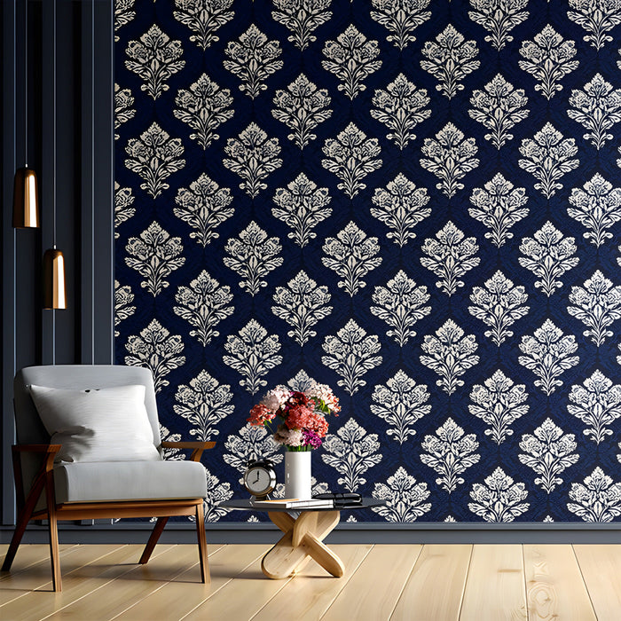 Luxury entryway interior featuring elegant navy floral damask wallpaper behind headboard.