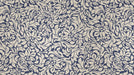 A two-tone damask wallpaper pattern featuring deep midnight blue and cream beige floral motifs and scrolling acanthus leaves.