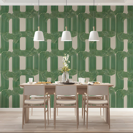 Modern dining room featuring green linear geometric wallpaper behind a wooden desk