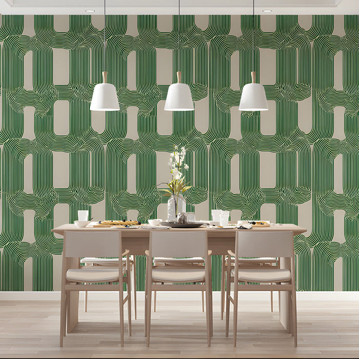 Modern dining room featuring green linear geometric wallpaper behind a wooden desk