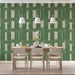 Modern dining room featuring green linear geometric wallpaper behind a wooden desk