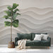 A calm living room space with a subtle, textured wave design on the accent wall.