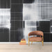 Minimalist study interior with a high-contrast abstract grid mural