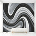 Fluid charcoal and white pattern used as a feature wall in a dining room.