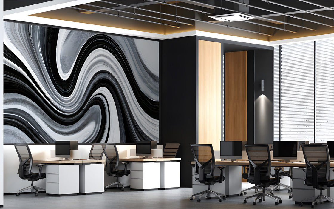 Monochrome swirl wallpaper behind a modern office with minimalist decor.