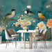 A bright, airy dining room showcasing the painterly peony mural on a feature wall behind a desk.