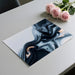 Sophisticated home office with a dramatic abstract mural wall and minimalist desk