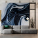 Modern commercial space wall featuring a monochrome fluid marble mural behind a gray sofa