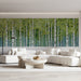 A serene home office space with a large-scale birch grove mural for a natural work backdrop.