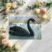 A serene home office featuring the swan wallpaper as a calming backdrop for a desk.