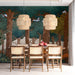 A quiet dining room styled with a whimsical woodland illustration mural on the main feature wall.
