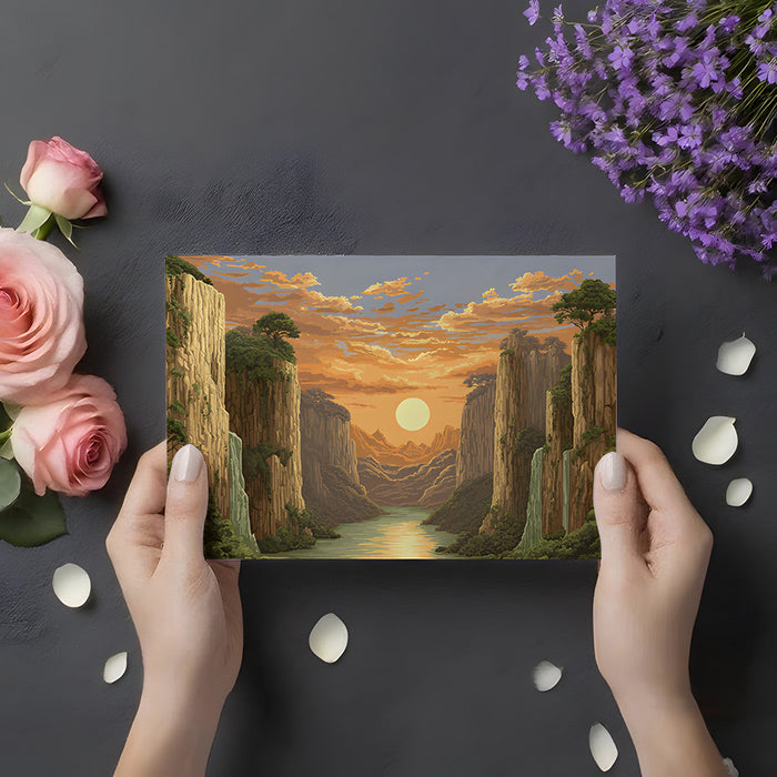 The golden canyon landscape wallpaper installed behind a wooden desk in a home office.