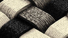 Macro close-up of a woven basket pattern mural in high-contrast black and cream ink sketch style.
