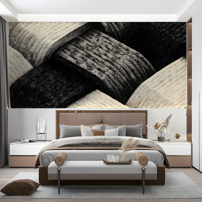 A minimalist bedroom with the black and cream woven pattern providing a graphic, textured backdrop for seating.