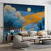 Moody living room featuring a moonlit landscape mural behind a dark wooden table.