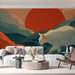 Modern living room featuring the mountain cat mural above a platform bed with minimalist wood furniture