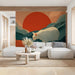 Creative home office with an artistic cat and mountain landscape mural on the main feature wall