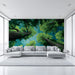 Creative living room wall covered in artistic forest canopy wallpaper design