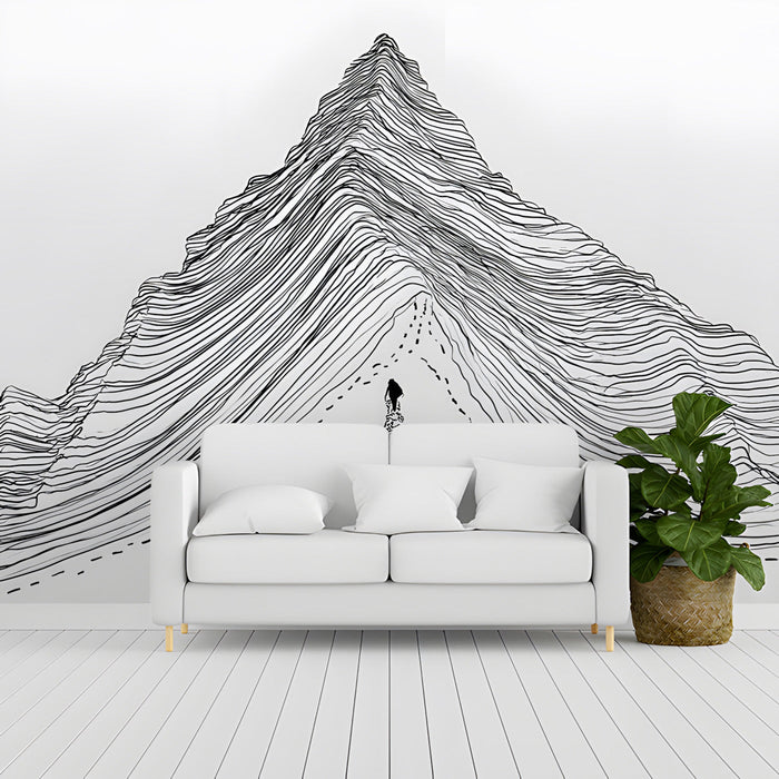 A bright hallway decorated with a sophisticated black ink mountain range wallpaper.