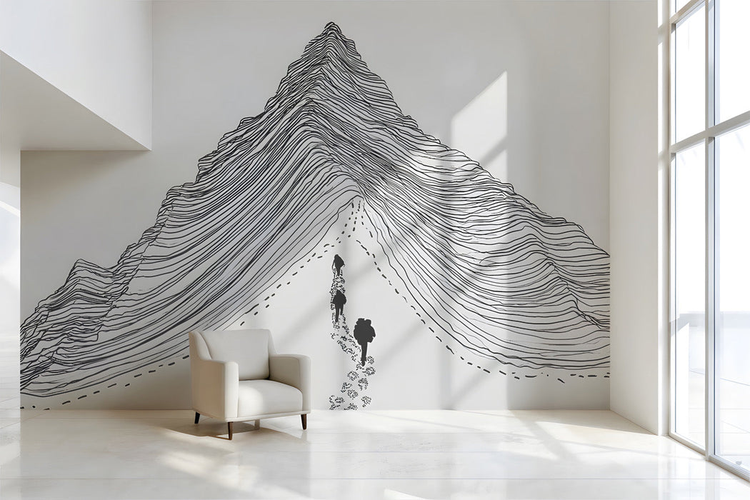 A clean, modern home office wall featuring a black and white mountain line art mural.