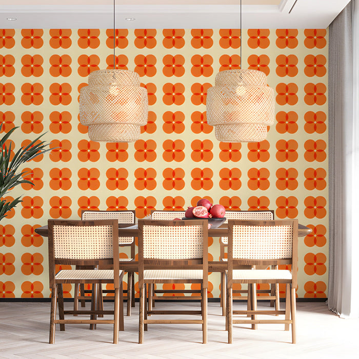 A cozy dining room space featuring a vibrant geometric floral wall mural.
