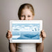 Blue ocean and polar wildlife wall mural in a child's bedroom with soft lighting