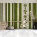 Bright home office space with botanical stripe accent wall and mid-century modern furniture