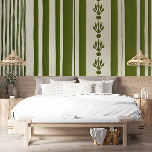 Sophisticated bedroom featuring a green botanical stripe wall mural behind a wooden dining table
