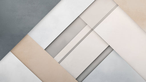 Abstract geometric mural wallpaper with layered diagonal shapes in charcoal, white, and sandy beige.