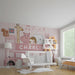 Personalized London bus mural installed in a bright nursery with white crib