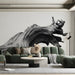 Quiet living room interior with a high-contrast natural wood art mural