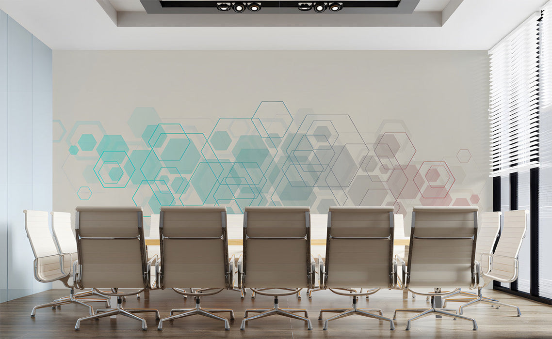 Modern home office featuring a light, geometric hexagonal mural wallpaper behind a minimalist wooden desk.