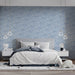 Dining room accent wall with light blue linear cloud pattern and minimalist decor