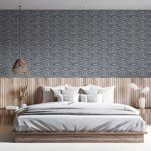 Geometric cloud pattern wallpaper behind a bedroom