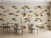 A cozy meeting room featuring an Asian cloud mural, paired with light wood furniture and linen bedding.