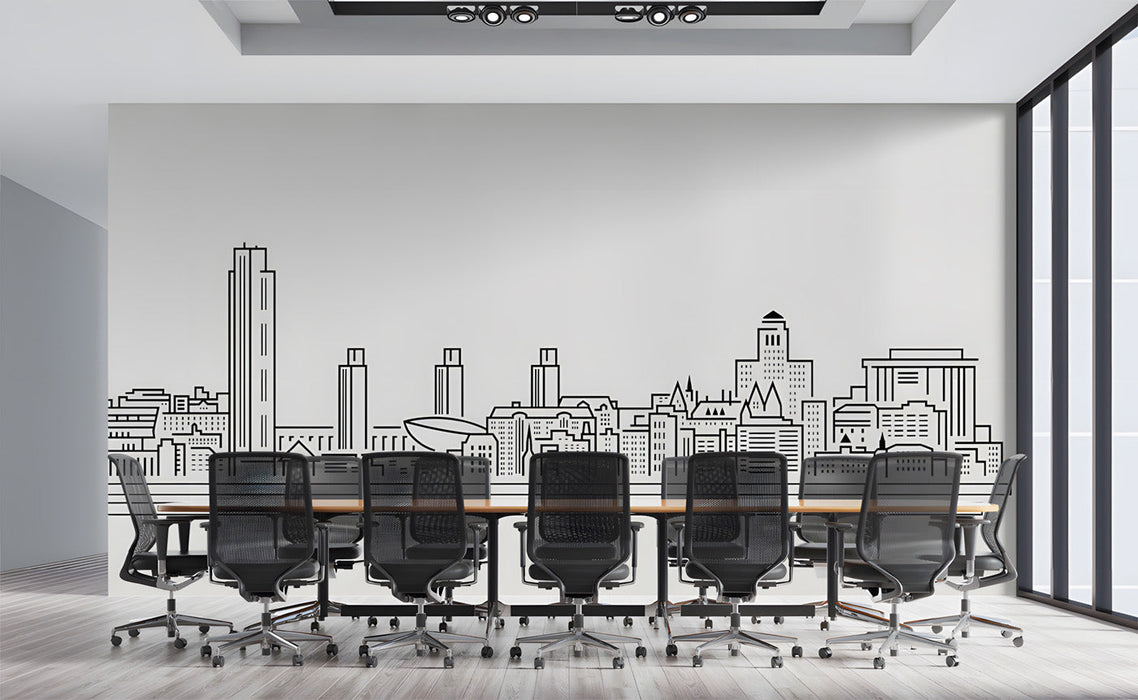 A contemporary meeting room interior with a black and white architectural city line art mural above a sofa.