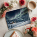 A home study featuring a peaceful winter night landscape wallpaper behind a wooden desk setup.