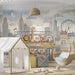 A cozy nursery featuring a whimsical city animal mural on the main wall with a white crib.