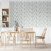 Modern dining room with sage green geometric line art wallpaper on the feature wall behind a wooden desk
