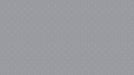 Repeating geometric pattern of thin charcoal gray concentric circles on a light slate background