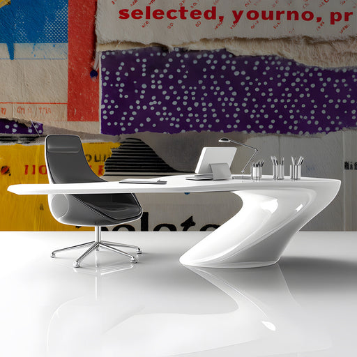 A creative home office featuring the collage wallpaper mural as an inspiring backdrop for a minimalist desk setup.